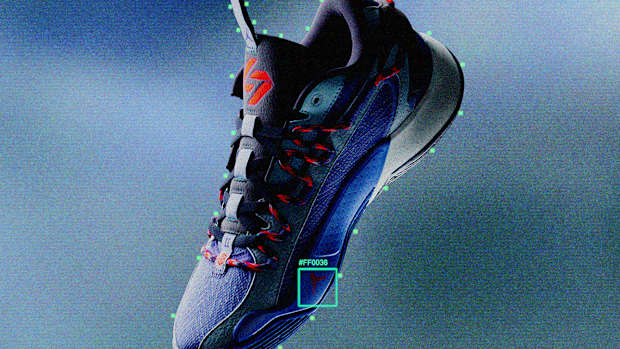 Side view of Luka Doncic's purple and red Jordan Brand shoes.